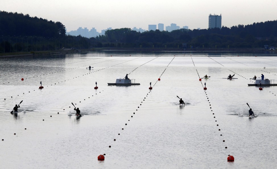 Belarusian athletes take part in training on a rowing channel near Zaslavl