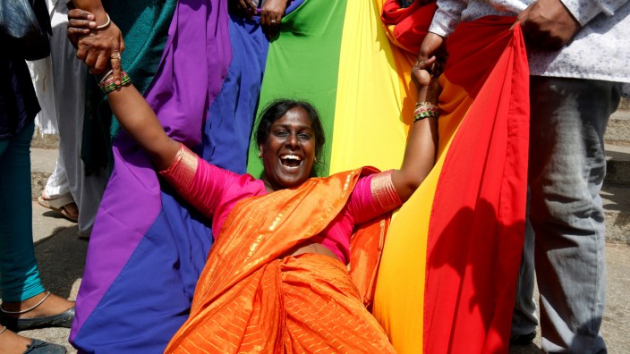 An activist of lesbian, gay, bisexual and transgender (LGBT) community celebrates after the Supreme Court's verdict of decriminalizing gay sex and revocation of the Section 377 law, in Bengaluru