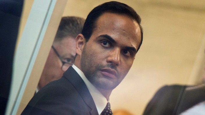 George Papadopoulos, a Trump foreign policy advisor in the 2016 election, is sentenced for lying about his contacts with Russians