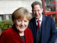 Angela Merkel und Hans-Georg Maaßen 2014 in Köln