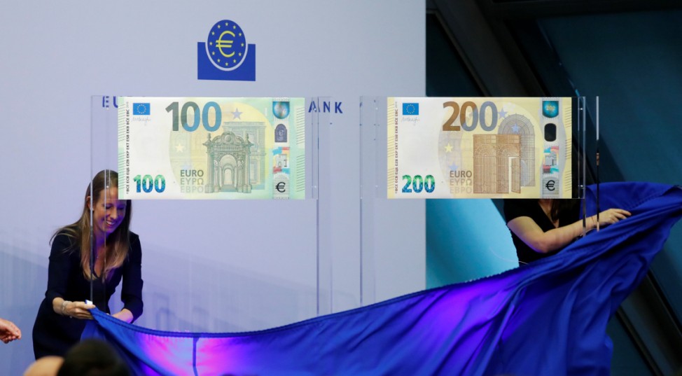 Yves Mersch, member of the Executive Board of the European Central Bank (ECB) presents the new 100- and 200-euro banknotes at the ECB headquarters in Frankfurt