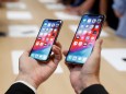 FILE PHOTO: A demonstration of the newly released Apple products is seen following the product launch event in Cupertino