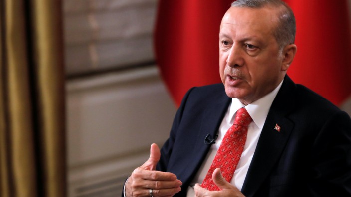 Turkish President Tayyip Erdogan sits during an interview with Reuters in Manhattan, New York