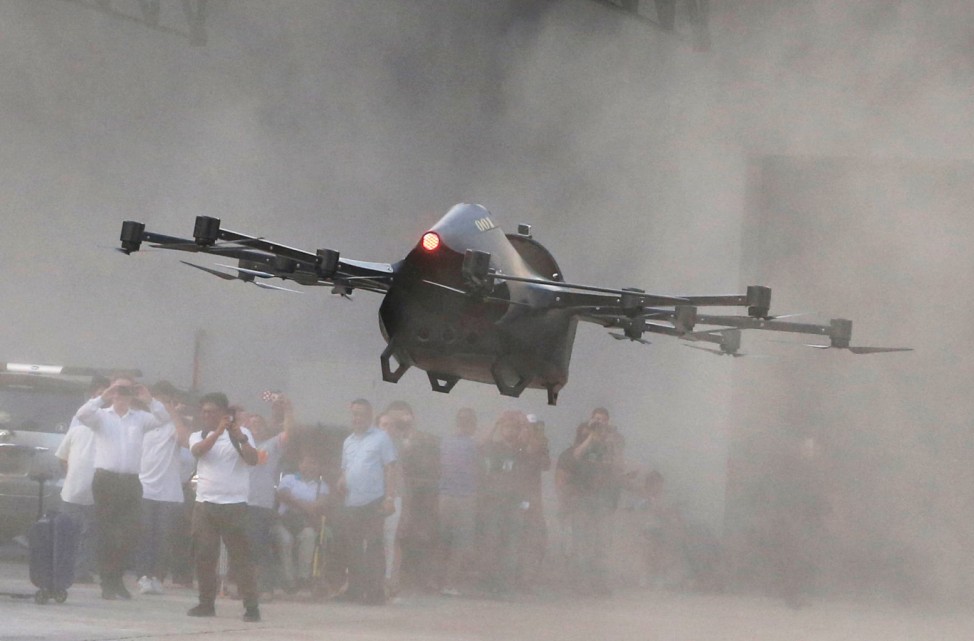 Filipino inventor Kyxz Mendiola tests his flying car during its launch in the province of Batangas