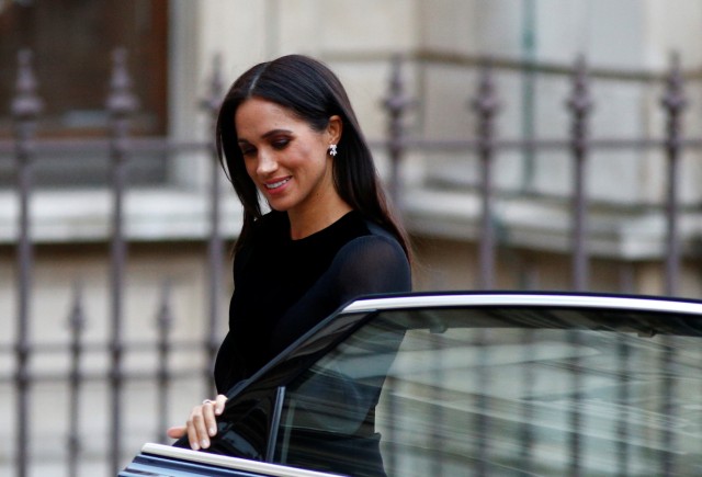 Britain's Meghan, the Duchess of Sussex, arrives at the opening of 'Oceania' at the Royal Academy of Arts in London