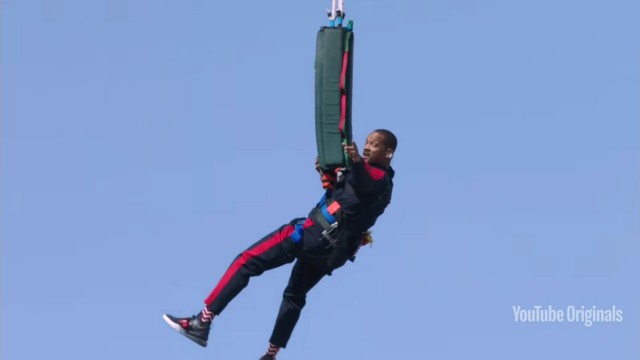 Actor Will Smith reacts after bungee jumping from a helicopter over the Grand Canyon