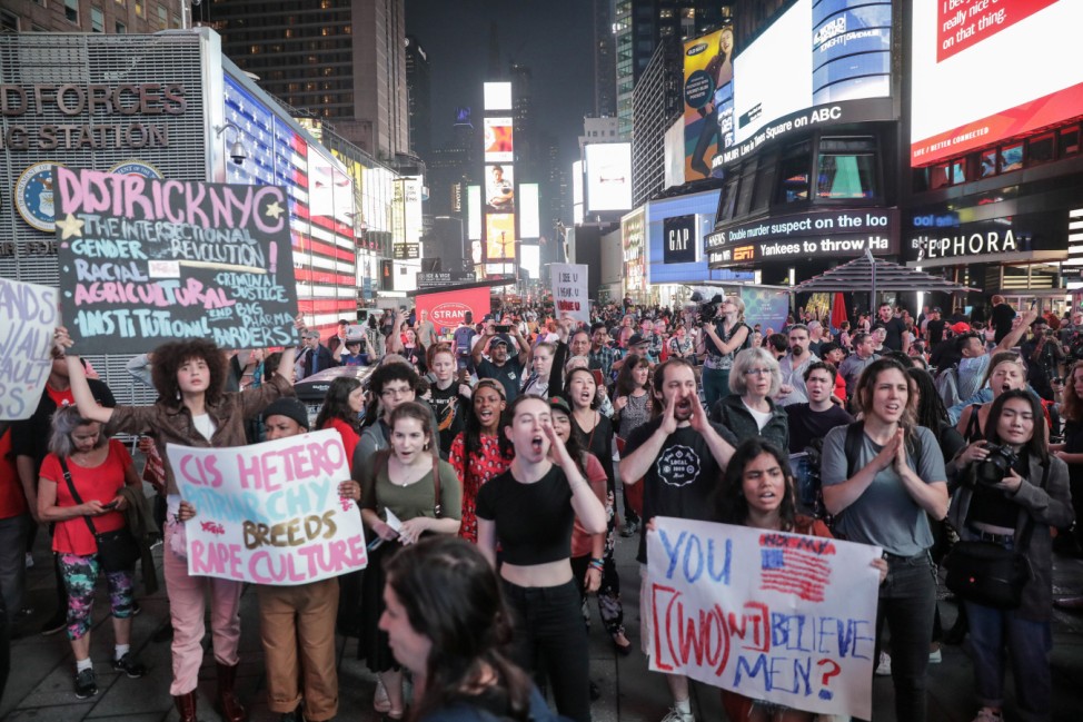 Activists hold a protest and rally in opposition to U.S. Supreme Court nominee Brett Kavanaugh near Times Square in New York
