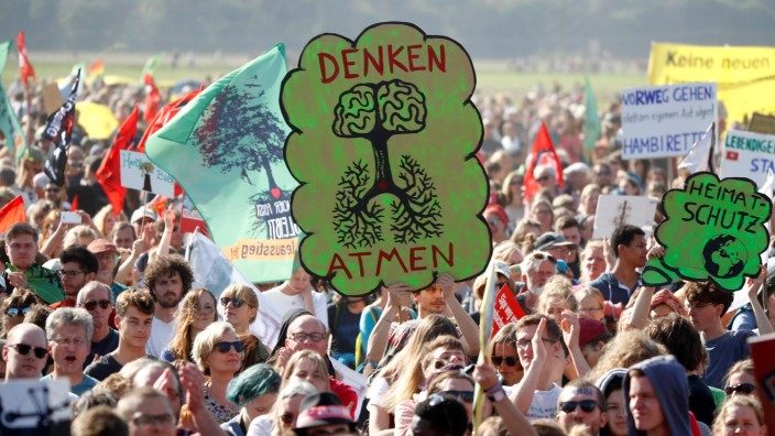 People protest for the preservation of the ancient forest 'Hambacher Forst' near the western German town of Kerpen-Buir west of Cologne