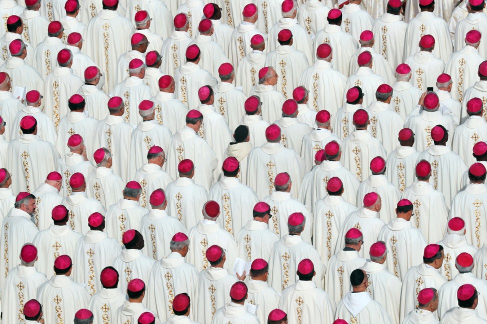 Bishops attend a Mass for the canonisation of the Pope Paul VI and El Salvador's Archbishop Oscar Romero at the Vatican