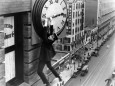 Harold Clayton Lloyd hangs from a clock in Safety Last 1923 Lloyd 1893 - 1971 was an American a