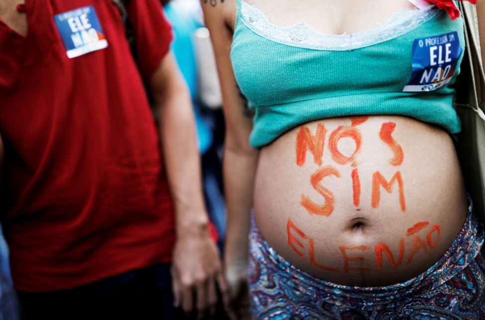 A pregnant woman protests against presidential candidate Jair Bolsonaro in Sao Paulo