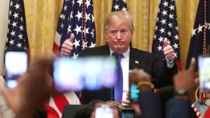 U.S. President Trump gives thumbs up as he talks about arrest of bombing suspect during event in East Room of White House in Washington