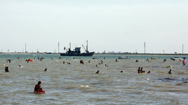 Tourists bathe in the Azov Sea in Henichesk Kherson Region southern Ukraine August 17 2018 Ukri