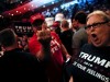 FILE PHOTO: Supporters of Republican U.S. presidential nominee Donald Trump scream and gesture at members of the media in a press area at a campaign rally in Cincinnati