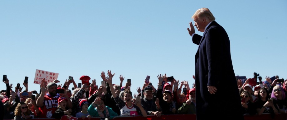 President Donald Trump acknowledges the audience during a campaign rally at Elko Regional Airport in Elko Nevada