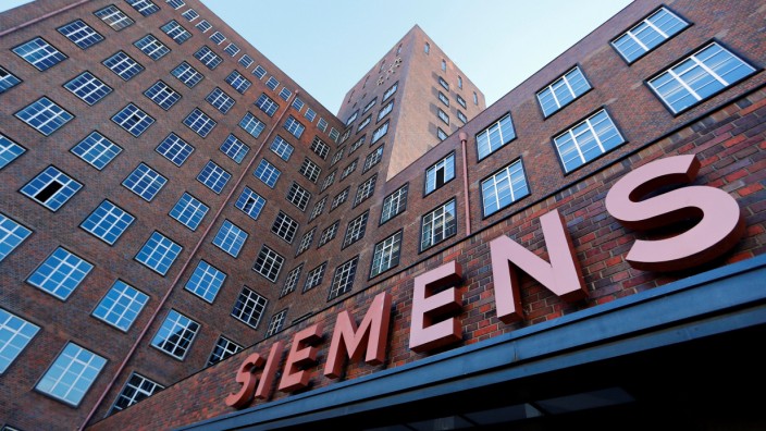 The Siemens logo is seen on a building in Siemensstadt in Berlin