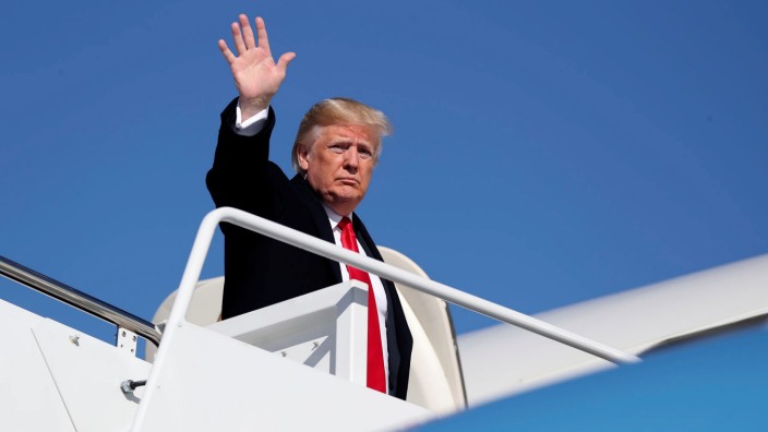 U.S. President Donald Trump boards Air Force One for travel to campaign events in Georgia and Tennessee from Joint Base Andrews