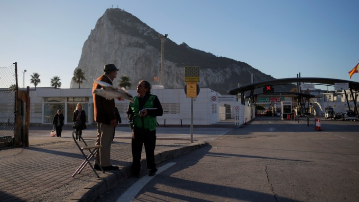 The Rock of the British overseas territory of Gibraltar, historically claimed by Spain, is seen at dawn near the border from the Spanish city of La Linea de la Concepcion