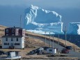 Residents view the first iceberg of the season as it passes the South Shore of Newfoundland
