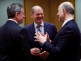 ECB President Mario Draghi, German Finance Minister Olaf Scholz and European Commissioner for Economic and Financial Affairs Pierre Moscovici attend a Euro zone finance ministers meeting in Brussels