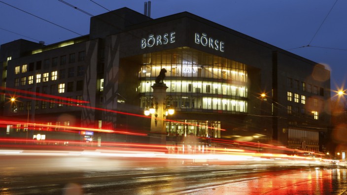 A longtime exposure shows traffic flowing past the building of the Swiss stock exchange in Zurich