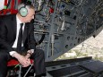 FILE PHOTO: Mattis looks out over Kabul as he arrives via helicopter at Resolute Support headquarters in Kabul