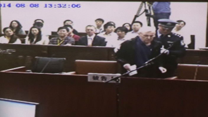 An internal court video shows British investigator Humphrey arriving at a courtroom after a lunch break, during his trial at Shanghai No.1 Intermediate People's Court