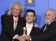 Brian May, Rami Malek und Roger Taylor 2019 bei den Globe Awards