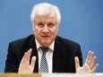 Interior Minister Horst Seehofer address the media during a news conference in Berlin