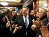 Panos Kammenos is applauded by his supporters as he arrives for a news conference in Athens