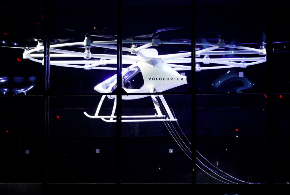 A two-seater Volocopter drone flies on stage at the Intel Keynote address at CES in Las Vegas