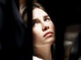 File photo of Amanda Knox, the U.S. student convicted of killing her British flatmate in Italy in 2007, looking on during a trial session in Perugia; Amanda Knocks