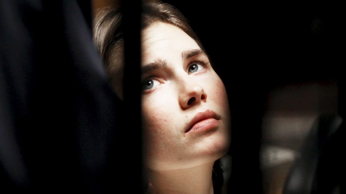 File photo of Amanda Knox, the U.S. student convicted of killing her British flatmate in Italy in 2007, looking on during a trial session in Perugia; Amanda Knocks