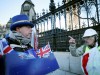 A pro-Brexit protester argues wth anti-Brexit campaigner Steve Bray outside the Houses of Parliament in London