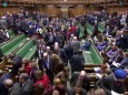 MPs leave to vote on PM Theresa May's Brexit 'plan B' in Parliament, in London