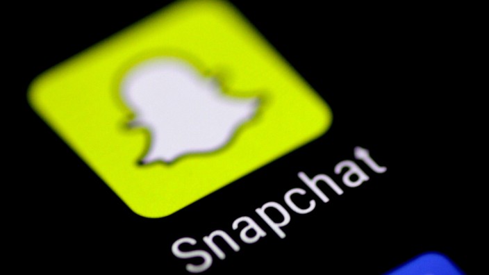 FILE PHOTO: FILE PHOTO: The Snapchat messaging application is seen on a phone screen
