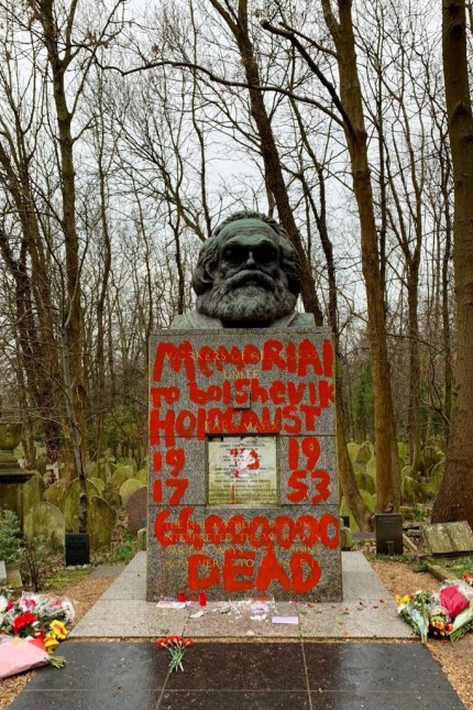 Philosopher Marx's grave site is seen vandalised with red paint in London