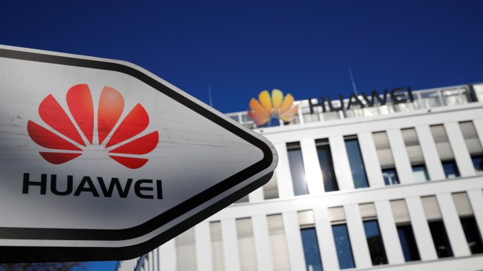 The logo of Huawei Technologies is pictured in front of the German headquarters of the Chinese telecommunications giant in Duesseldorf