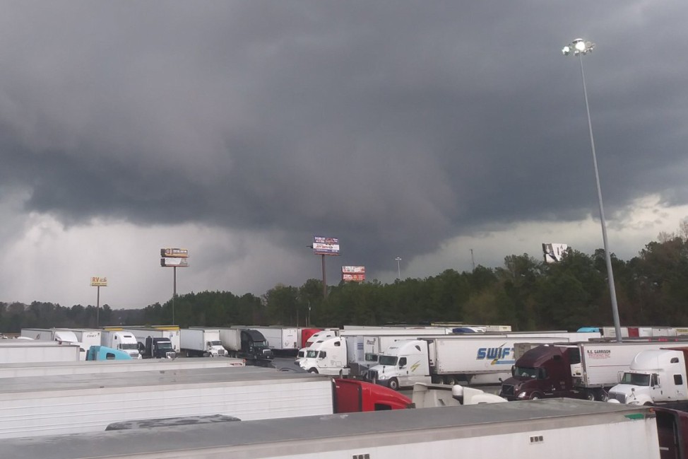 A view of a tornado seen in the distance at Warner Robins, Georgia, U.S. in this March 3, 2019 picture obtained from social media
