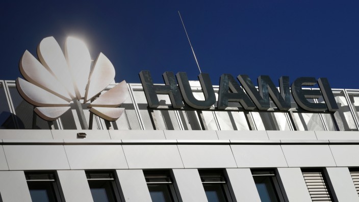 FILE PHOTO - The logo of China's Huawei Technologies shines in the bright sun over the headquarters of the telecommunications giant in Duesseldorf