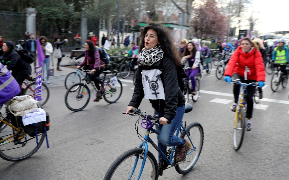 Women take part in a bike protest during a nationwide feminist strike on International Women's Day in Madrid