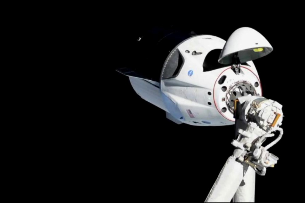 The SpaceX Crew Dragon capsule approaches the International Space Station