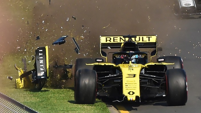 Renault's Daniel Ricciardo crashes at the start of the Formula One F1 Australian Grand Prix at the Albert Park Grand Prix Circuit in Melbourne