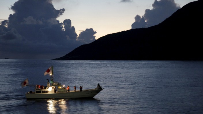 File photo of a fishing boat sailing around a group of disputed islands known as Senkaku in Japan and Diaoyu in China in the East China Sea