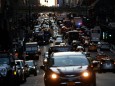 Traffic is pictured at twilight along 42nd St. in Manhattan