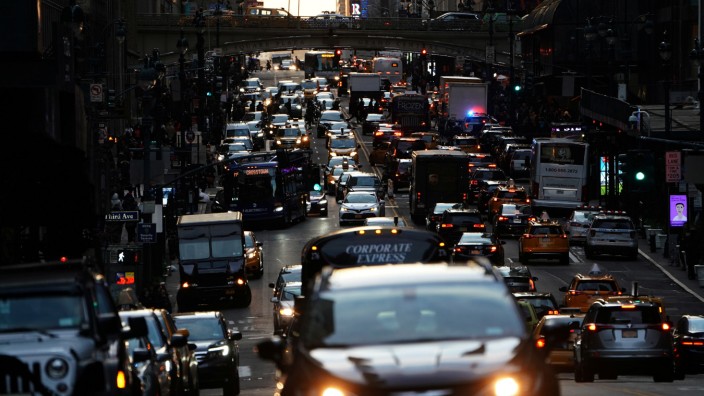 Traffic is pictured at twilight along 42nd St. in Manhattan