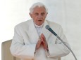 FILE PHOTO: Pope Benedict XVI finishes his last general audience in St Peter's Square at the Vatican