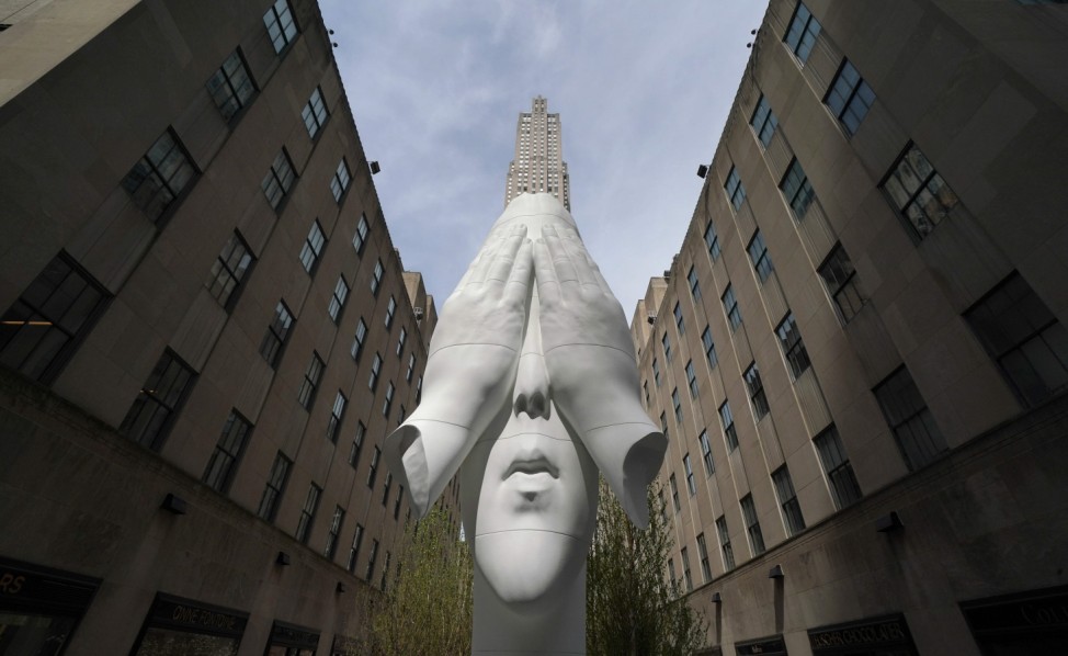 Frieze sculpture at Rockefeller Center features 20 sculptures from 14
