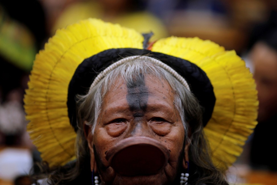 Raoni Metuktire, a leader of the Brazilian indigenous ethnic Kayapo attends a meeting with congressmen during the Terra Livre camp, or Free Land camp, at the National Congress in Brasilia