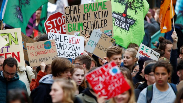 Protesters of the Fridays for Future movement march through the city of Essen to protest against German utility RWE during the company's annual shareholders meeting in Essen